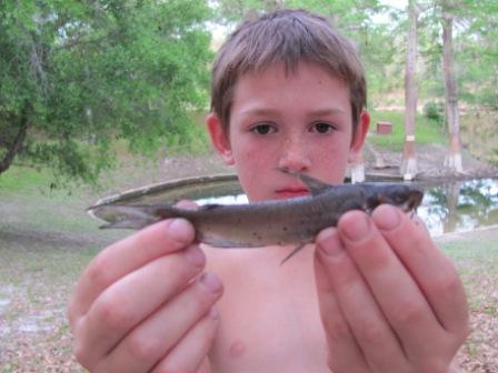 Young Boy with Little Fish