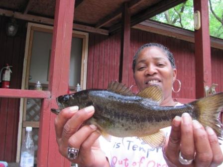 Woman Holding Large Mouth Bass